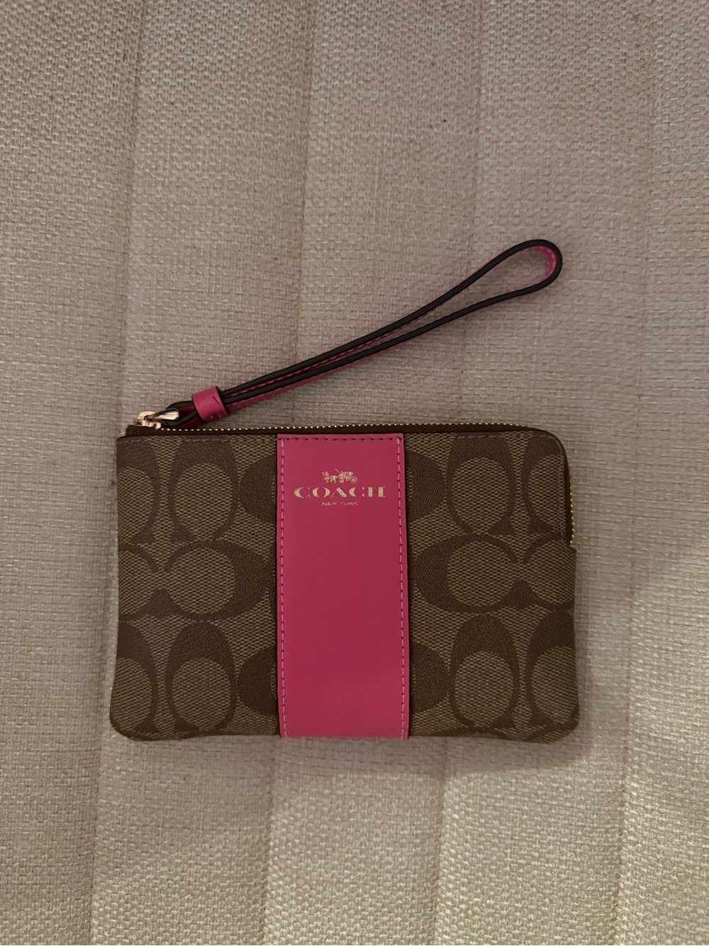 Coach Brown Signature Canvas Wristlet with Pink Center Stripe